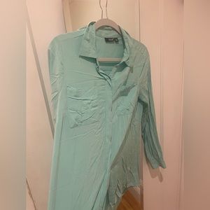 Turquoise button down in size Medium